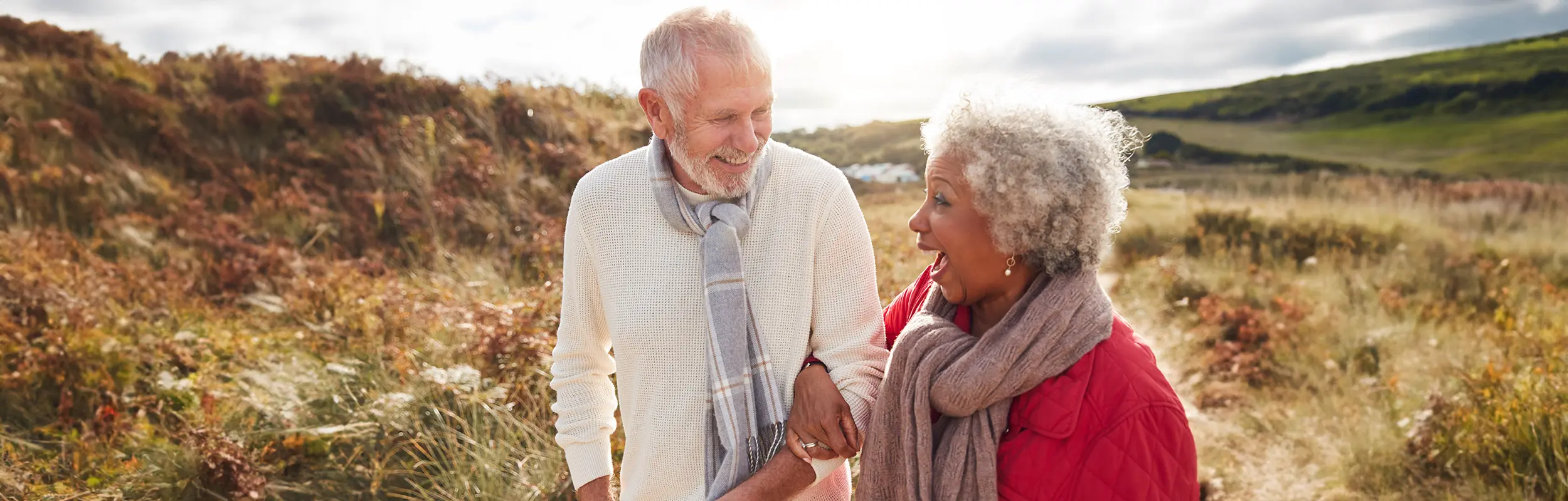 aging couple in field